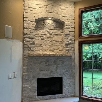 Debbie's Painting - White wash over dark red and brownish stone. - Painters Near Me
