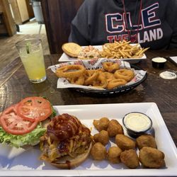 The Basement Sports Bar & Grill - Sriracha Burger Cowboy Burger Fried Shrooms Basket of Onion Rings ranch margarita