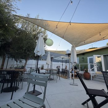 Benchmark at Maison Fox - Patio seating - New American Near Me - Fullerton, California Benchmark at Maison Fox - Patio seating - New American Near Me - Fullerton, California