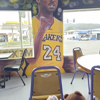 Alejandro's Tacos - The sticker on the back of the chairs! - Tacos Near Me - Honolulu, Hawaii