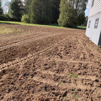 Phillips Excavating - Regrade of back yard - Excavation Services Near Me