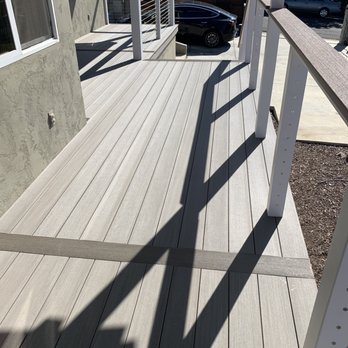 Blue Coast Deck & Patio - Front of our wrap around porch. Still finishing up the cable railing... - Decks & Railing Near Me Blue Coast Deck & Patio - Front of our wrap around porch. Still finishing up the cable railing... - Decks & Railing Near Me