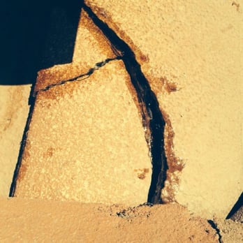 Tesla Energy - They broke this tile and put caulk on it to try to slap a bandaid on it. Caulk, really?! - Solar Installation Near Me Tesla Energy - They broke this tile and put caulk on it to try to slap a bandaid on it. Caulk, really?! - Solar Installation Near Me