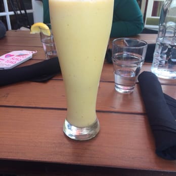 SunCafe - Orange Cream-sickle smoothie(agave, pineapple, and fresh orange) topped with goji berries and coconut flakes!! - Vegan Near Me - Studio City, California SunCafe - Orange Cream-sickle smoothie(agave, pineapple, and fresh orange) topped with goji berries and coconut flakes!! - Vegan Near Me - Studio City, California
