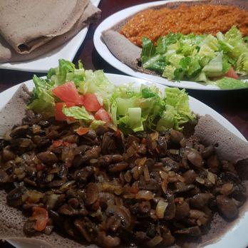 MLK Café - two plates of food on a table - Ethiopian Near Me - Oakland, California MLK Café - two plates of food on a table - Ethiopian Near Me - Oakland, California