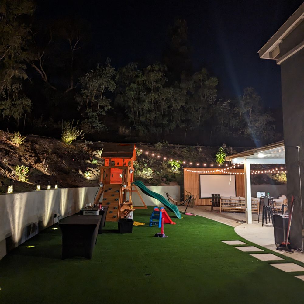 JG Lawns Turf - Turf at night with uplighting - Landscaping Near Me - El Cajon, California