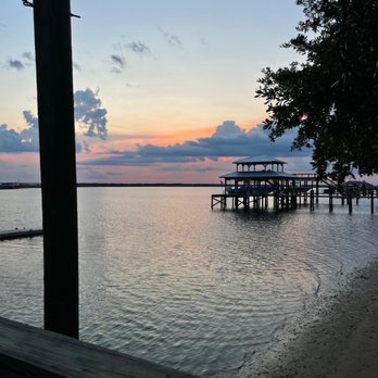 Caps On The Water - Sunset by the dock on the water - Seafood Near Me - St Augustine, Florida