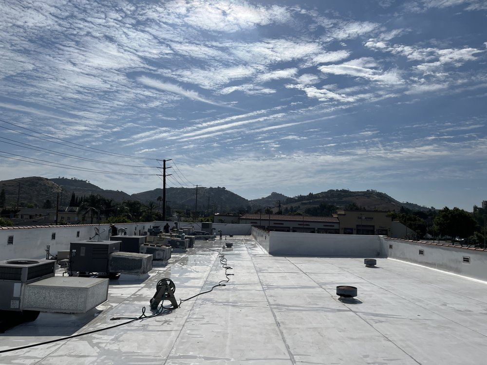 Slide of Swell Roofing