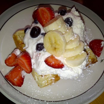 Eats - Homemade Waffle Berries & Creme: berries, pomegranate, bananas, honey butter, whip cream - American Near Me - San Francisco, California