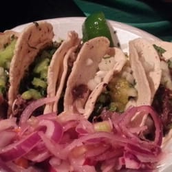 Felipe's Tacos - Lengua and cabeza tacos, pickled onion