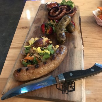 Surly Brewing - Trio of housemade sausages ($23). Don't miss! - Breweries Near Me - Minneapolis, Minnesota