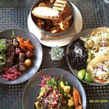 Shores Restaurant - Clockwise from left: ribeye, cioppino, fish tacos, birria. Yum! - New American Near Me - La Jolla, California Shores Restaurant - Clockwise from left: ribeye, cioppino, fish tacos, birria. Yum! - New American Near Me - La Jolla, California