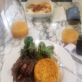 Guggin Cafe & Grill - a plate of food - Caribbean Near Me - Elmont, New York Guggin Cafe & Grill - a plate of food - Caribbean Near Me - Elmont, New York