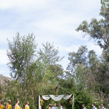 Quail Haven Farm - backdrop of trees at front of ceremony - Horseback Riding Near Me - Vista, California