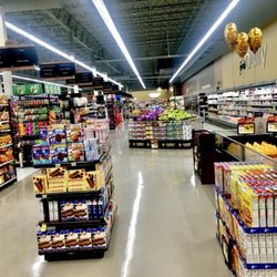 Lin's Market Richfield - Rear store aisle near juice and milk
