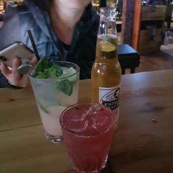 Thomas Street Warehouse - peach mojito, blackberry cocktail of some kind, substitute corona beer - Bars Near Me - Seattle, Washington