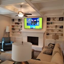 Precise Installations - 75 inch tv mounted over fireplace.