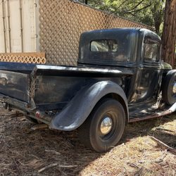 The Hidden Grotto - really cool, vintage Dodge truck parked outside the store (backside view)