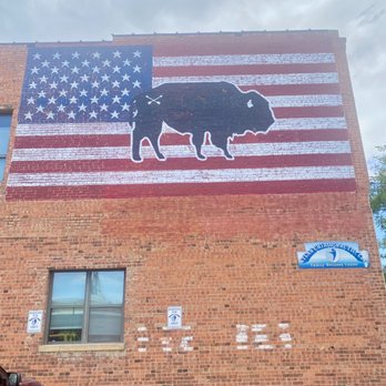 Bison Union Coffee Company - an american flag painted on the side of a building - Coffee Roasteries Near Me - Sheridan, Wyoming Bison Union Coffee Company - an american flag painted on the side of a building - Coffee Roasteries Near Me - Sheridan, Wyoming