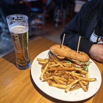 Tuman's Tap and Grill - Tall beer and Grilled Amish Chicken Breast Sandwich - Pubs Near Me - Chicago, Illinois