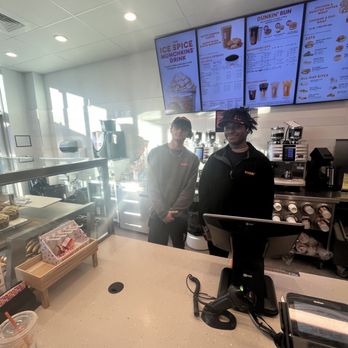 Dunkin - a man standing at a counter in a fast food restaurant - Coffee & Tea Near Me - Helena, Alabama Dunkin - a man standing at a counter in a fast food restaurant - Coffee & Tea Near Me - Helena, Alabama