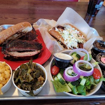 City Barbeque - Clockwise: ribs and chicken, smoked sausage, salad, colored greens and mac'n'cheese. - Barbeque Near Me - Whitestown, Indiana City Barbeque - Clockwise: ribs and chicken, smoked sausage, salad, colored greens and mac'n'cheese. - Barbeque Near Me - Whitestown, Indiana