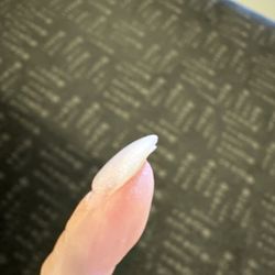 Golden Nails & Spa - Sad. Fake nail did not glue onto the Natural nail well at the tip here