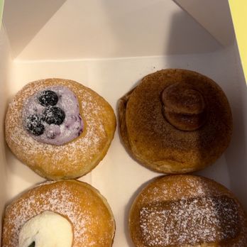 Creamy Seoul - Left to right: blueberry, chocolate, yuja, lotus - Donuts Near Me - Flower Mound, Texas Creamy Seoul - Left to right: blueberry, chocolate, yuja, lotus - Donuts Near Me - Flower Mound, Texas