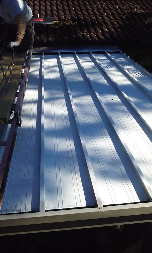 Slide of All Weather Insulated Roof Coating Services