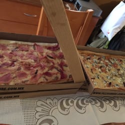 Pizza Amore - Pizza de Jamon serrano con Higo y queso de cabra con jitomate respectivamente