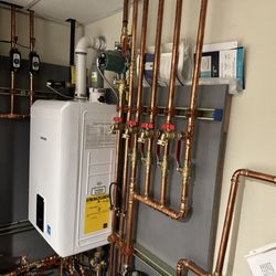 SEBPOL - Oil to Natural Gas Conversion, replacement of oil fired hot water boiler by Installing High Efficiency Navien Combination Boiler