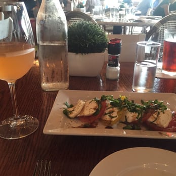 Adair Kitchen - Tomato mozzarella basil appetizer and white sangria. Both delicious! - New American Near Me - Houston, Texas Adair Kitchen - Tomato mozzarella basil appetizer and white sangria. Both delicious! - New American Near Me - Houston, Texas