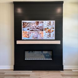 Tri County Technology - Framed TV over a fireplace