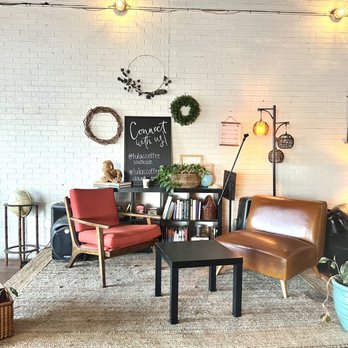 Lula’s Coffee - a living room with a white brick wall - Coffee & Tea Near Me - Florence, South Carolina Lula’s Coffee - a living room with a white brick wall - Coffee & Tea Near Me - Florence, South Carolina
