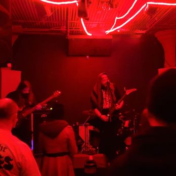 The White Rock Lounge - a band playing in a dimly lit room - Music Venues Near Me - Saint Paul, Minnesota The White Rock Lounge - a band playing in a dimly lit room - Music Venues Near Me - Saint Paul, Minnesota