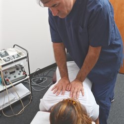 Dr. B Well Chiropractic Health & Wellness - Hands on adjusting.