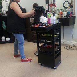 Belky's Beauty Salon - Getting rollers in.