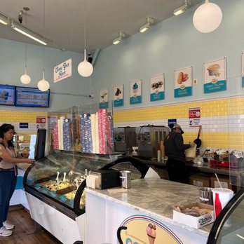Coney's Cones - a woman standing in front of the counter - Ice Cream & Frozen Yogurt Near Me - Brooklyn, New York Coney's Cones - a woman standing in front of the counter - Ice Cream & Frozen Yogurt Near Me - Brooklyn, New York