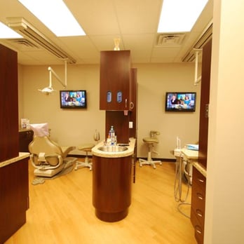 Dearborn Architects - Dental Clinic (Chicago) - Newer style exam room separation with digital technology. - Architects Near Me - Chicago, Illinois Dearborn Architects - Dental Clinic (Chicago) - Newer style exam room separation with digital technology. - Architects Near Me - Chicago, Illinois