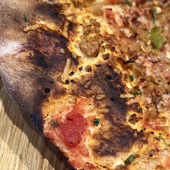 Sauce Pizza & Wine - Burnt like this in every piece and took 25 minutes - Pizza Near Me - Tucson, Arizona Sauce Pizza & Wine - Burnt like this in every piece and took 25 minutes - Pizza Near Me - Tucson, Arizona