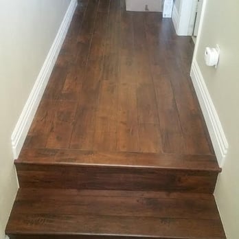 Classic Carpet & Tile - wood laminate - Walnut Harrington, with 5in molding - Carpeting Near Me - Whittier, California Classic Carpet & Tile - wood laminate - Walnut Harrington, with 5in molding - Carpeting Near Me - Whittier, California