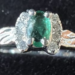 That emerald hasn't been so bright and clear for years. The little diamonds now sparkle in the sun.
