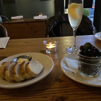 Brasserie Four - Olives, bread with lemon salt butter- yum - French Near Me - Walla Walla, Washington Brasserie Four - Olives, bread with lemon salt butter- yum - French Near Me - Walla Walla, Washington
