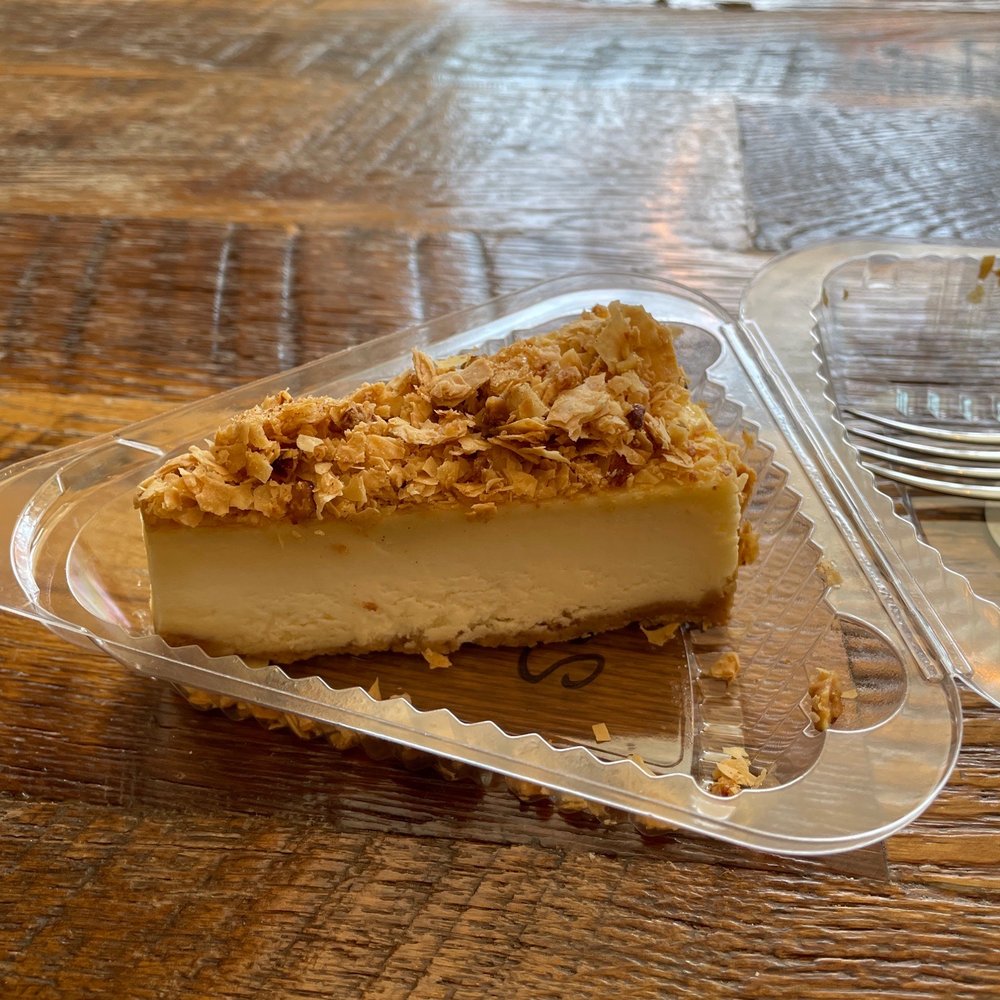 Pirho Grill - Baklava cheesecake in its triangle container - Mediterranean Near Me - Ottawa, Ontario Pirho Grill - Baklava cheesecake in its triangle container - Mediterranean Near Me - Ottawa, Ontario