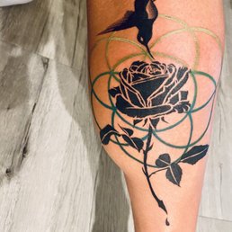 Hummingbird with Rose and Geometric Design. Hummingbird with Rose and Geometric Design.
