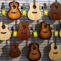 Rieman Music - We have a nice selection of acoustic, electric, and bass guitars.