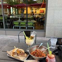 Exterior outside entrance of Hopdoddy Burger Bar - Farmhouse Deluxe Burger (closest to window) and Double Bacon Jam Burger. Frozen Strawberry Marg. & skinny Marg. - Denver, Colorado Exterior outside entrance of Hopdoddy Burger Bar - Farmhouse Deluxe Burger (closest to window) and Double Bacon Jam Burger. Frozen Strawberry Marg. & skinny Marg. - Denver, Colorado