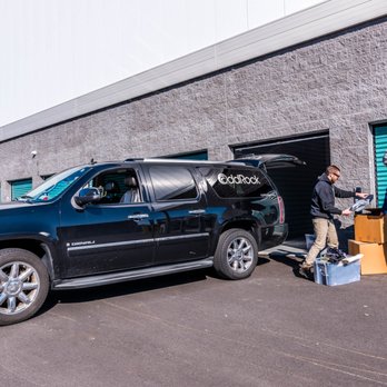 Freeport Self Storage - Customer picking up items from his drive up unit. - Self Storage Near Me - Freeport, New York