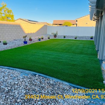 Re-Leaf Landscape - Completed backyard turf and river rock surrounding the turf. - Landscaping Near Me - Winchester, California Re-Leaf Landscape - Completed backyard turf and river rock surrounding the turf. - Landscaping Near Me - Winchester, California
