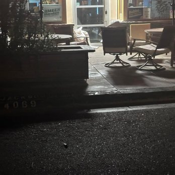 Jackson Market - Package of bread at the store's entry door early morning. - Grocery Near Me - Culver City, California Jackson Market - Package of bread at the store's entry door early morning. - Grocery Near Me - Culver City, California